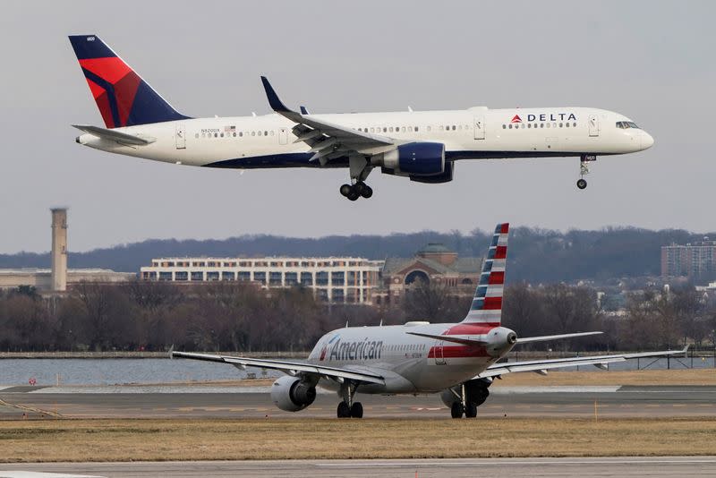 FILE PHOTO: A Delta Air Lines aircraft lands at Reagan National Airport in Arlington, Virginia