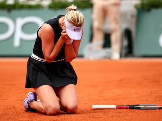 Potapova celebrates her first round victory over Kerber at the French Open (Getty)