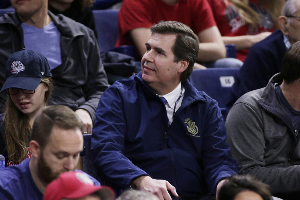 FILE - Gonzaga President Thayne McCulloh sits in the stands before an NCAA college basketball game between Gonzaga and Texas Southern in Spokane, Wash., Friday, Nov. 10, 2017. There’s nothing else in West Coast college basketball to rival what Gonzaga has created over the last two decades. “I am an undergrad degree-holder of the institution and so have been part of it for over 35 years and I’ve seen sort of what it was before we have experienced the modern era of basketball and what it has been during that time,” Gonzaga President McCulloh said. (AP Photo/Young Kwak, File)