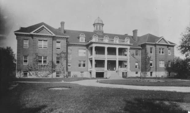 The former Mohawk Institute in Brantford, Ont., is shown in this undated photograph. Six Nations of the Grand River wants the property searched for possible burial sites.  (Canada Dept. of the Interior/Library and Archives Canada/PA-043613 - image credit)
