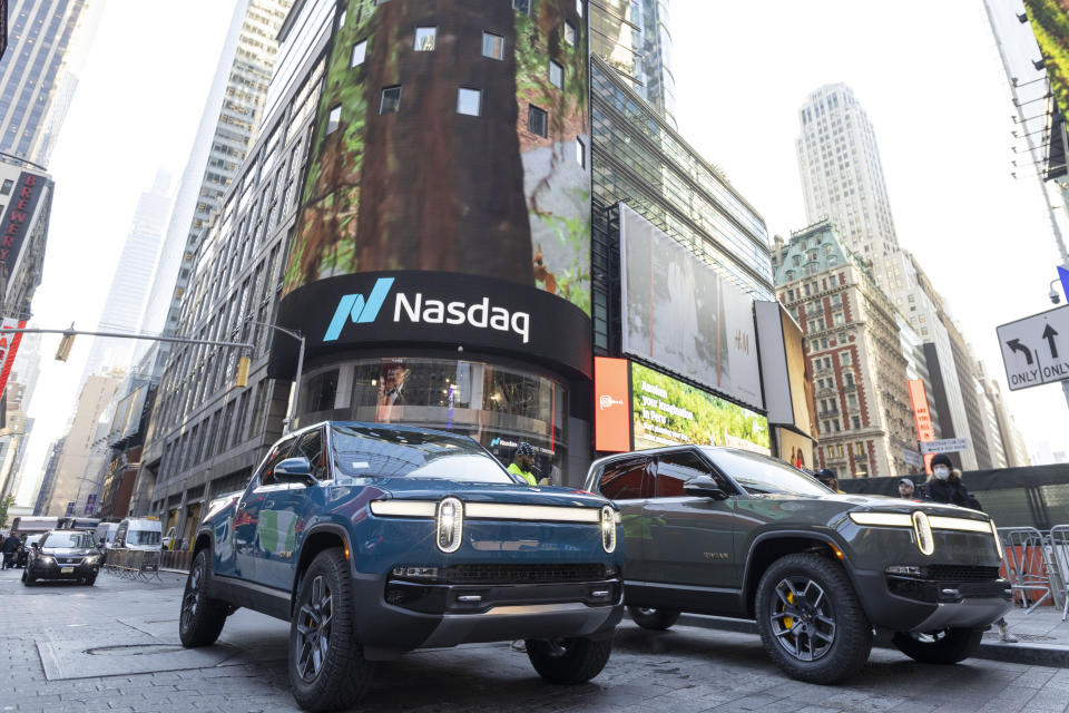 IMAGE DISTRIBUTED FOR RIVIAN AUTOMOTIVE, LLC - Rivian R1T all-electric truck in Times Square on listing day, on Wednesday, Nov. 10, 2021 in New York. Electric vehicle maker Rivian Automotive will announce Thursday, Dec. 15,  that it's building a $5 billion battery and assembly plant east of Atlanta that's projected to employ 7,500 workers, sources briefed on the decision told The Associated Press. (Ann-Sophie Fjello-Jensen/AP Images for Rivian Automotive, LLC)