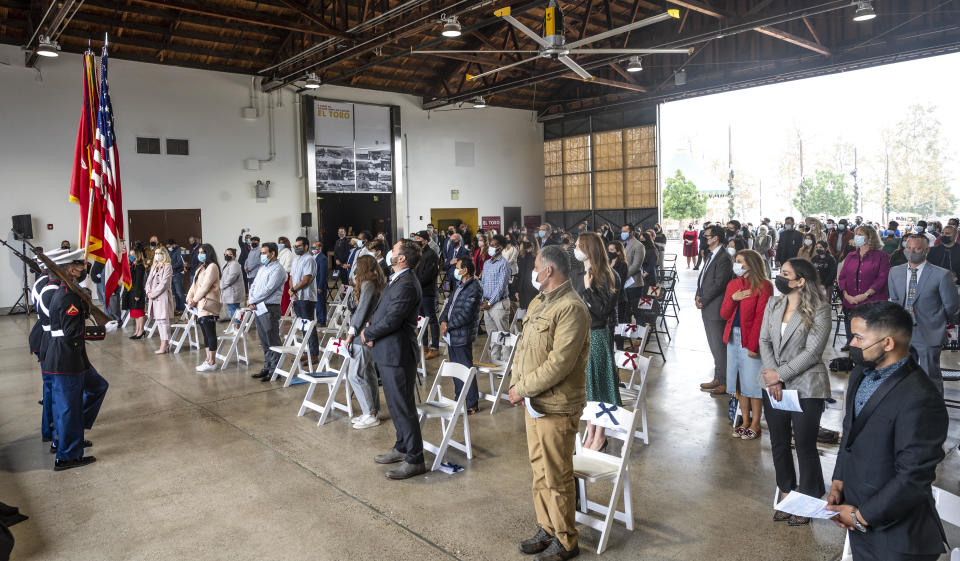 Participants stand during a U.S. naturalization ceremony in Irvine, California, on Thursday, December 2, 2021. / Credit: Paul Bersebach/MediaNews Group/Orange County Register via Getty Images