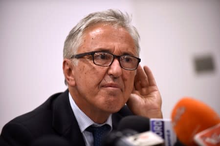 FILE PHOTO: Autostrade per l'Italia CEO Castellucci gestures during news conference in Genoa