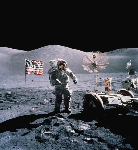 Making footsteps in the lunar soil.