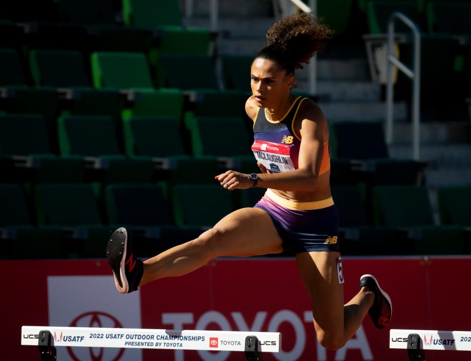 Sydney McLaughlin leaps over a hurdle on her way to a first place finish in the first round of the women’s 400 meter hurdles at the USA Track and Field Championships Thursday, June 23, 2022, at Hayward Field in Eugene, Ore. 