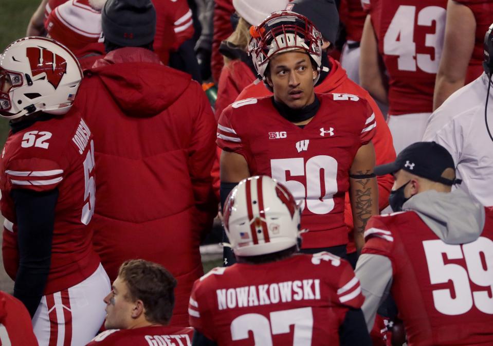 Wisconsin linebacker Izayah Green-May (50), shown in a game in 2020, has two tackles in 12 games this season.