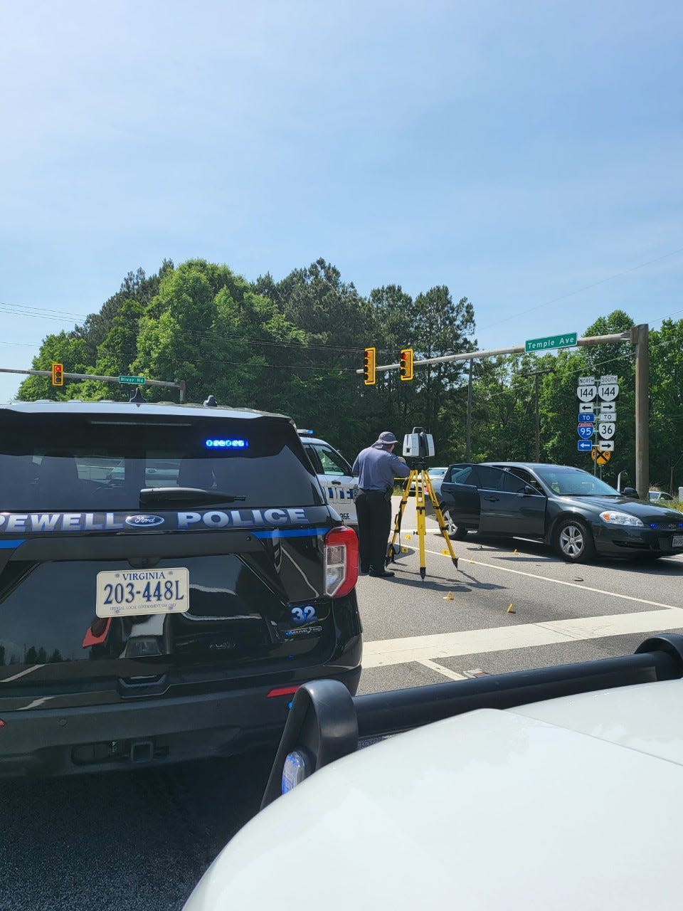 Authorities investigate the scene of an officer-involved fatal shooting in Prince George County Wednesday, June 1, 2022.