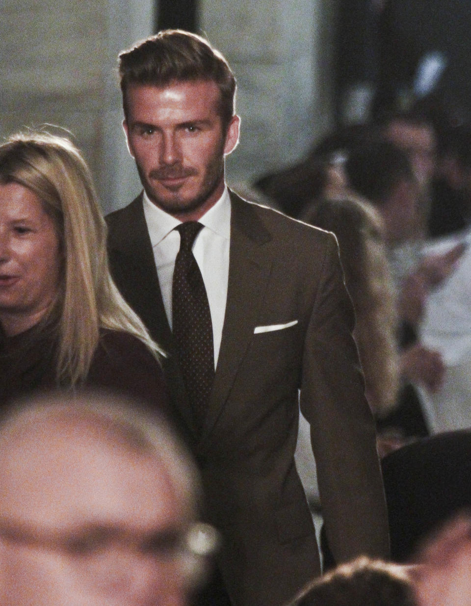 David Beckham arrives at the show for Victoria Beckham's Spring 2013 fashion collection on Sunday, Sept. 9, 2012 in New York. (AP Photo/Bebeto Matthews)