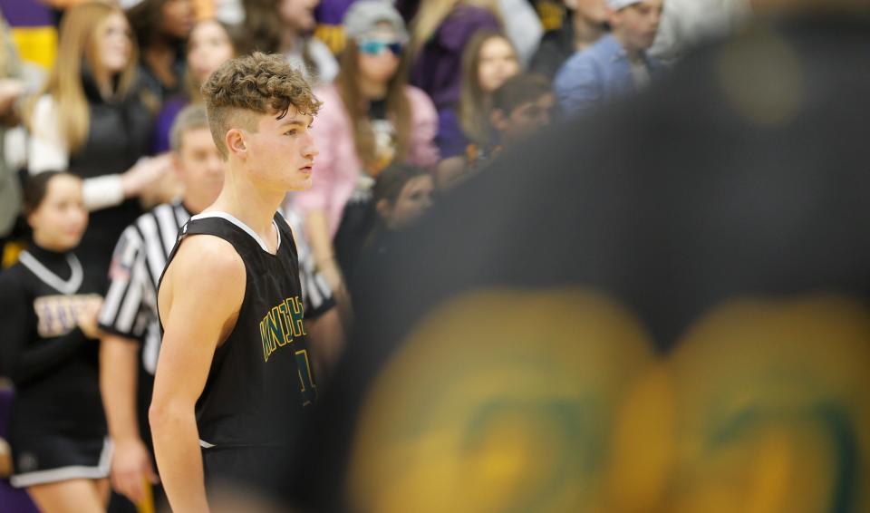 Northeastern senior Keaton Mikesell waits for play to resume during the Wayne County Tournament championship against Hagerstown Jan. 7, 2023.