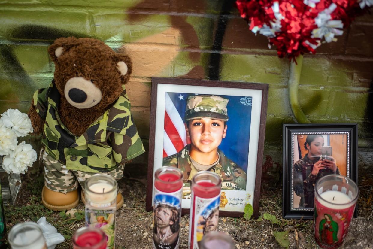 Image: People pay respects at a mural of Vanessa Guillen, a soldier based at nearby Fort Hood (Sergio Flores / Getty Images file)