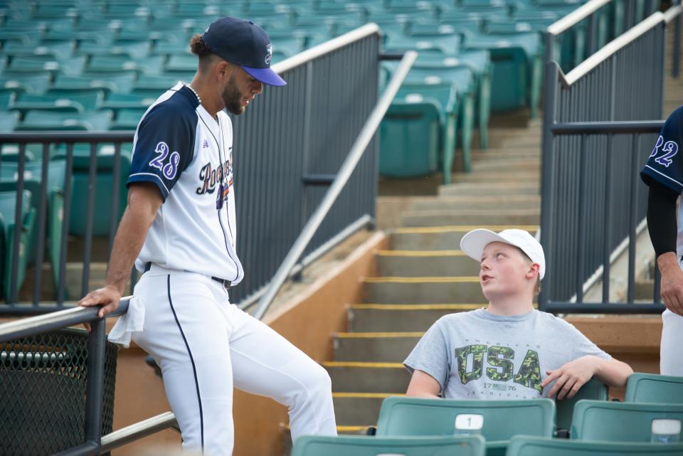 Infielder Brandon Valdez talks with a fan during the Jackson Rockabillys' "Greet the Goats" event inside The Ballpark in Jackson on Tuesday, May 30, 2023. 