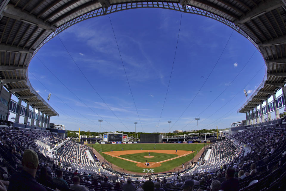 The New York Yankees face the Toronto Blue Jays in a spring training exhibition baseball game with a limited number of socially distanced fans in attendance at George M. Steinbrenner Field in Tampa, Fla., Saturday, March 27, 2021. (AP Photo/Gene J. Puskar)