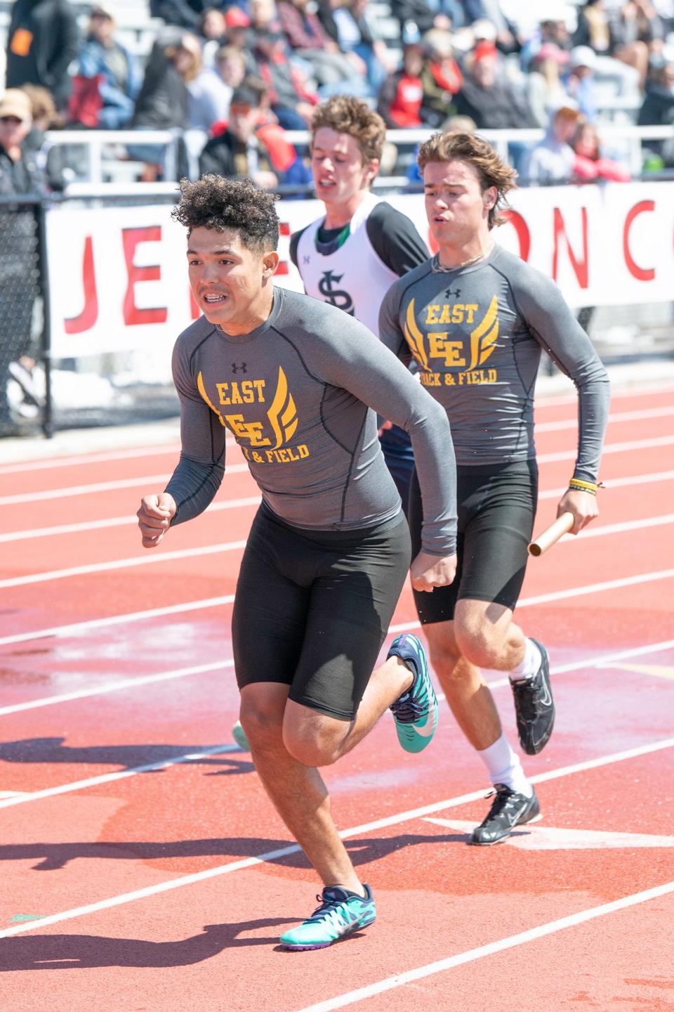 Pueblo East's Rocco Rowell, right, begins to hand off the baton to teammate Izaiah Trujillo in the Class 4A 4x100-meter relay during the CHSSA state track and field meet on Saturday, May 21, 2022 at Jeffco Stadium.