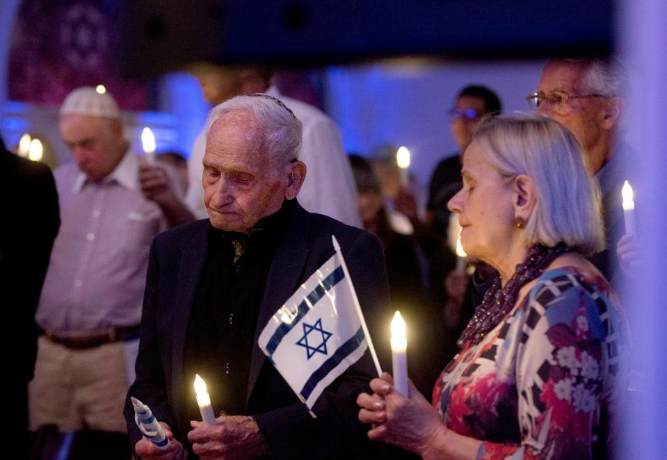 Aron and Henryka Bell are seen at last month's We Stand with Israel event at the Palm Beach Synagogue. The couple's favorite Thanksgiving dish, bigos, serves as a memento to the hardships the couple faced before emigrating to the U.S.