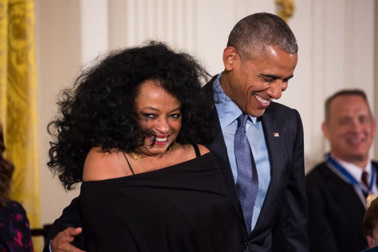 Ross being honored with the Presidential Freedom award with President Obama. (Photo by Getty Images)