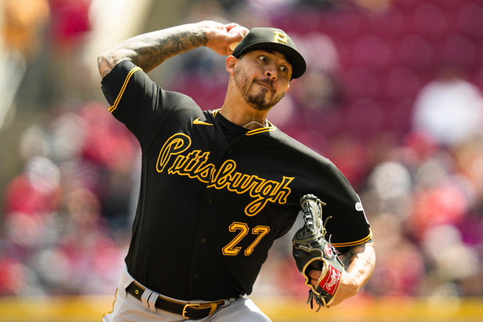 Pittsburgh Pirates starting pitcher Vince Velasquez (27) throws against the Cincinnati Reds in the third inning of a baseball game in Cincinnati, Sunday, April 2, 2023. (AP Photo/Jeff Dean)