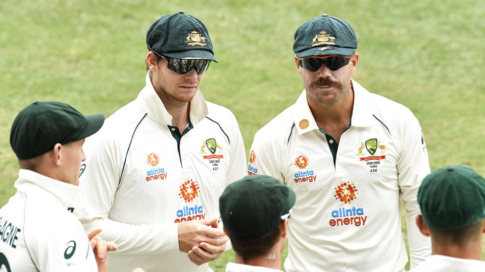 Steve Smith and David Warner talking to the players at The Gabba on January 17, 2021 in Brisbane, Australia.