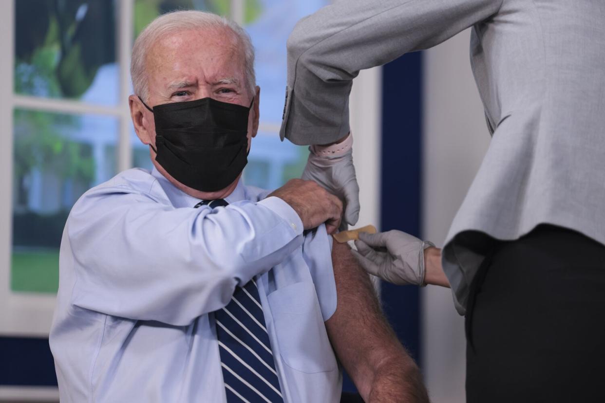 President Joe Biden receives a third shot of the Pfizer Covid-19 vaccine