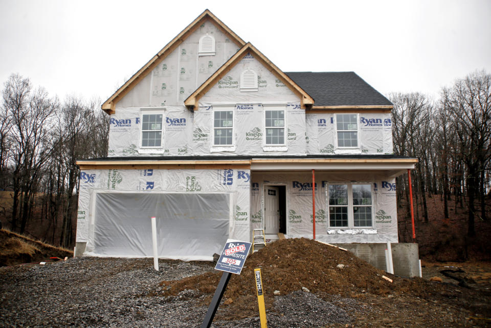 In this Friday, Feb. 16, 2018, photo, construction is under way at a new housing plan in Zelienople, Pa. With the supply of existing homes available to buy at “an all-time low” nationwide, according to the National Association of Realtors, homebuyers are looking at other options that include building a house. (AP Photo/Keith Srakocic)