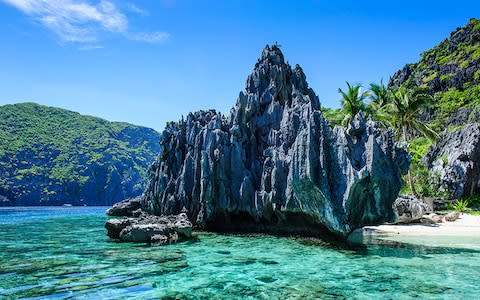 The Philippines is made up for 7,640 islands - Credit: michael runkel/robert harding