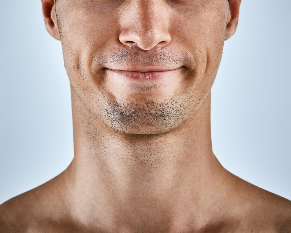The bottom half of a man's face.