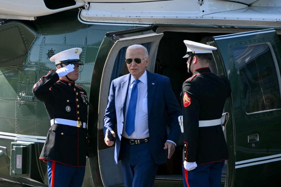 US president Joe Biden steps off Marine One upon arrival at Soldier Field Landing Zone in Chicago, Illinois, on 8 May 2024 (AFP via Getty Images)