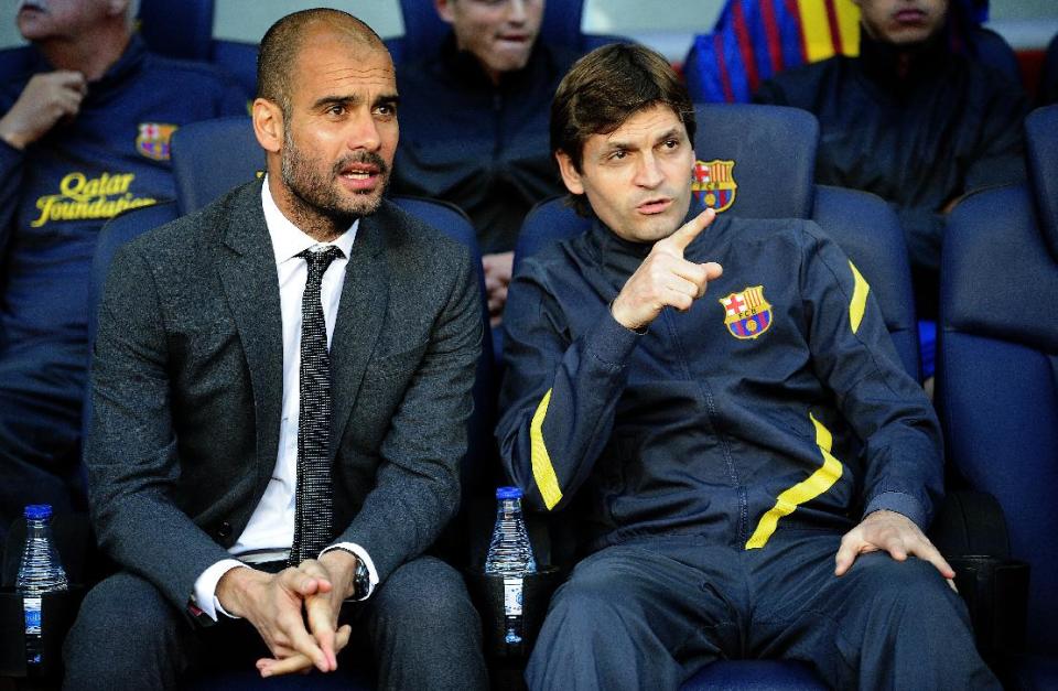 FILE - In this May 2, 2012 file photo, FC Barcelona's coach, Pep Guardiola, left, and second coach Tito Vilanova are seen prior to the match between FC Barcelona and Malaga during a Spanish La Liga soccer match at the Camp Nou stadium in Barcelona, Spain. FC Barcelona announced on their web page Friday April 25, 2014 that Vilanova has died Friday following a long battle with throat cancer. He previously stepped down as coach when he became seriously ill and was unable to continue. Vilanova, the coach who succeeded Pep Guardiola at Barcelona and won the Spanish league title in his only season in charge. He was 45. (AP Photo/Manu Fernandez, File)