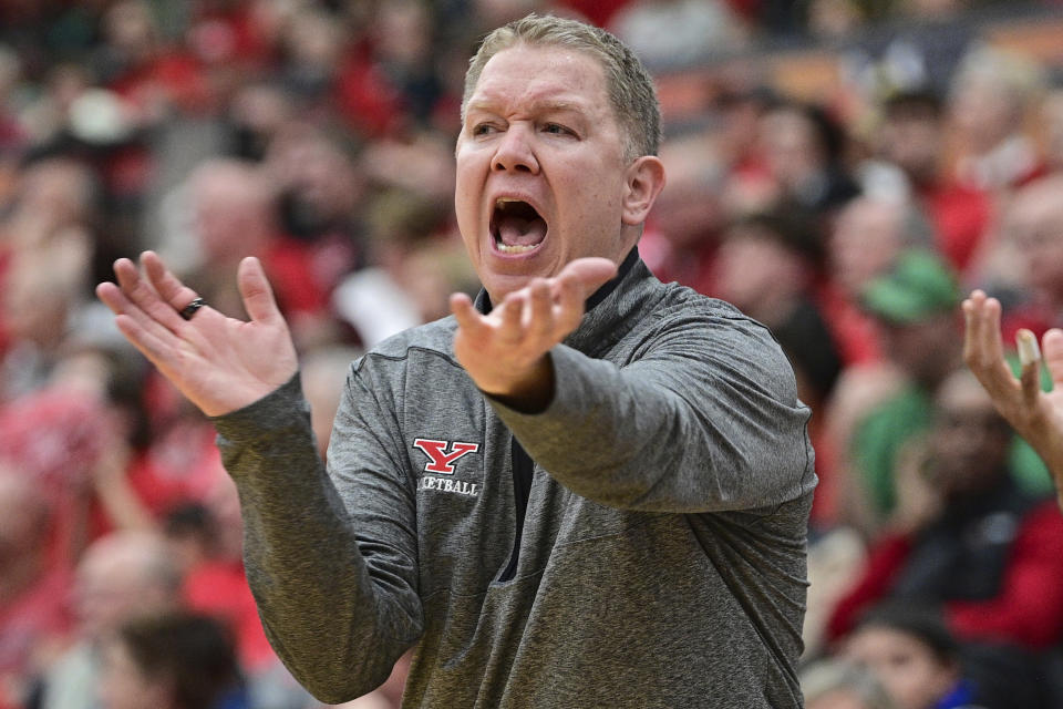 Youngstown State head coach Jerrod Calhoun reacts during the first half of an NCAA college basketball game against Detroit Mercy in the quarterfinals of the Horizon League tournament Thursday, March 2, 2023, in Youngstown, Ohio. (AP Photo/David Dermer)