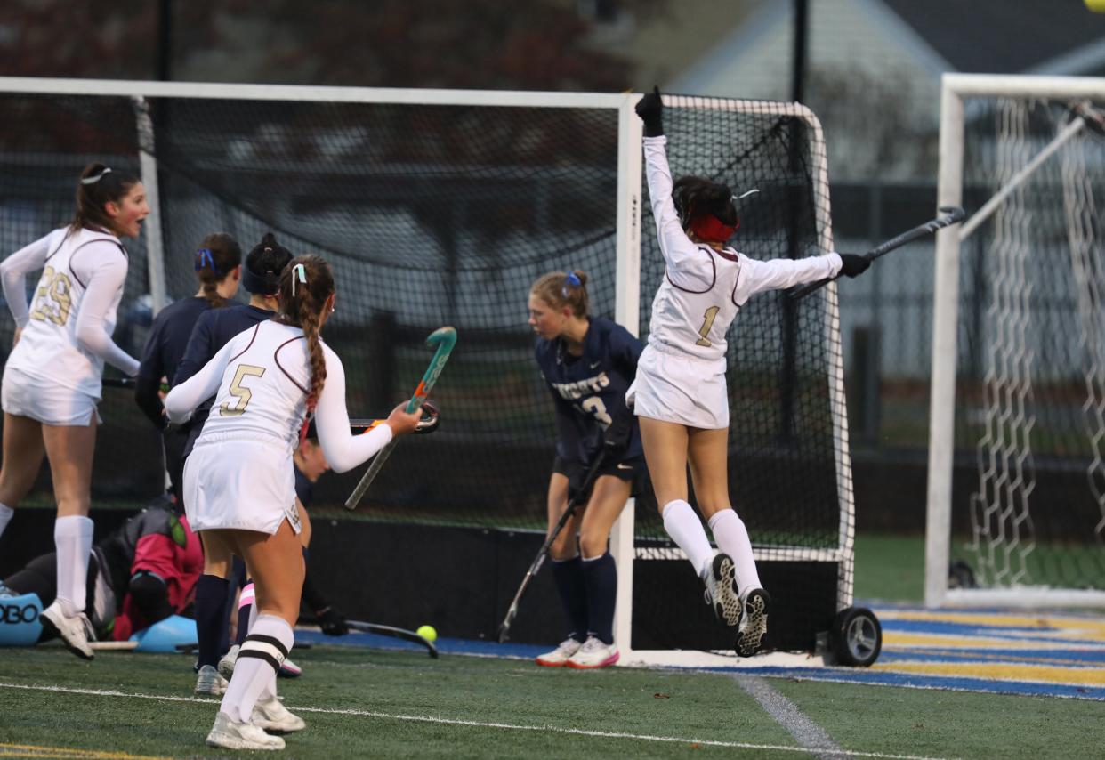 Pittsford Mendon's Saara Fazili reacts to her goal on Pittsford Sutherland.