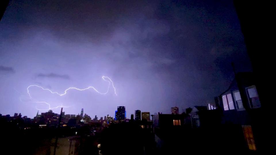 Lightning strikes are seen above buildings in San Fransisco, California on 5th January (Lapine via REUTERS)