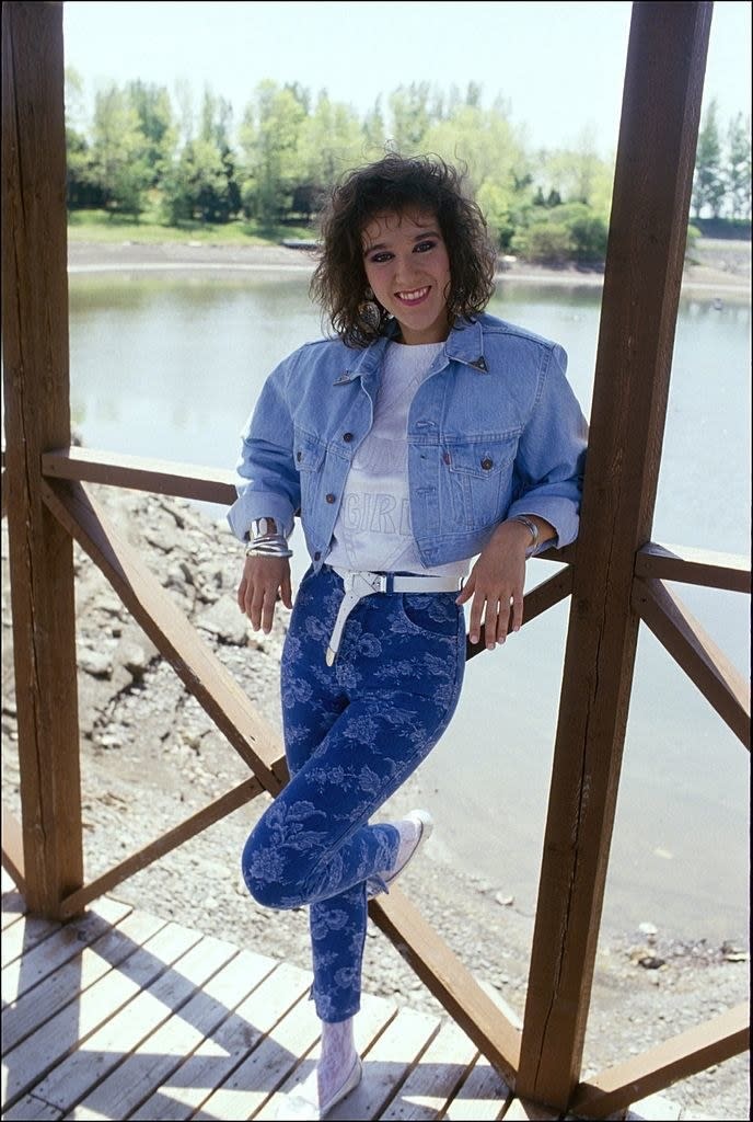 celine posing outside in a denim outfit