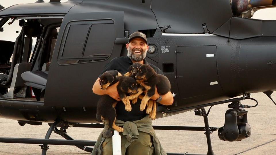 Trevor Skaggs poses with the animals