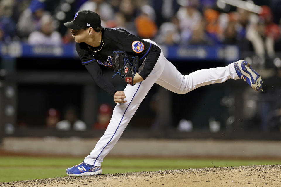 New York Mets pitcher Drew Smith follows through on throw during the sixth inning of the team's baseball game against the Philadelphia Phillies on Friday, April 29, 2022, in New York. (AP Photo/Adam Hunger)