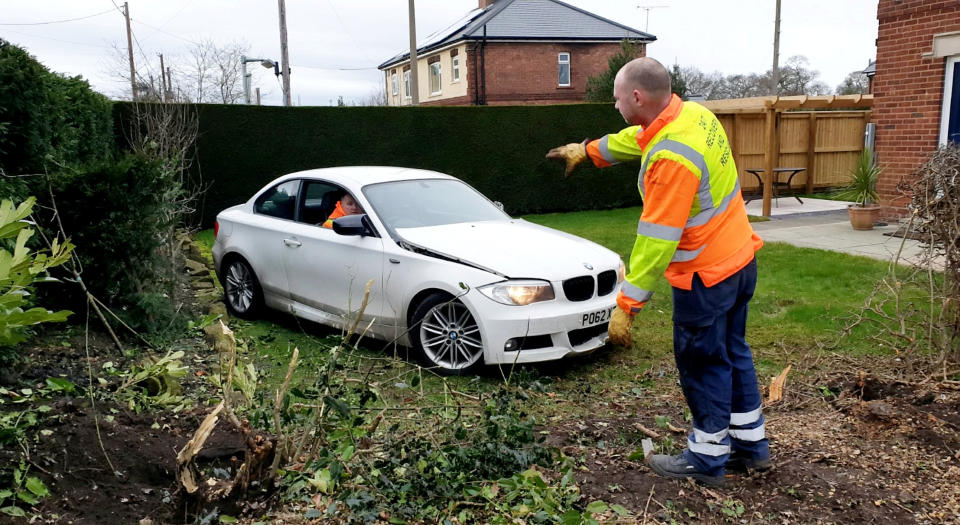 Scott Thomas is campaigning for the speed limit on the road by his house to be halved after three cars ended up in his garden. (SWNS)