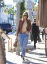 Gigi in LA wearing<b><a rel="nofollow noopener" href="http://www.polyvore.com/cgi/shop?query=RE%2FDONE+Levi%27s" target="_blank" data-ylk="slk:RE/DONE Levi's;elm:context_link;itc:0;sec:content-canvas" class="link ">RE/DONE Levi's</a></b> <br><br>Credit: Splash