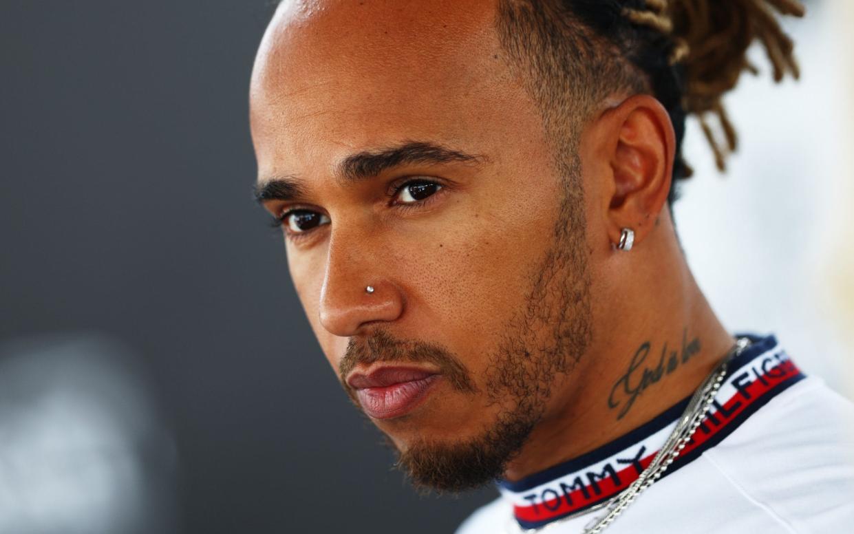 Lewis Hamilton of Great Britain and Mercedes talks to the media in the Paddock prior to practice ahead of the F1 Grand Prix of Canada at Circuit Gilles Villeneuve on June 17, 2022 in Montreal, Quebec - Clive Rose/Getty Images
