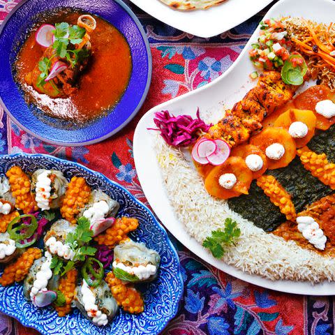 <p>Courtesy of Afghan Kitchen</p> Plates at Surrey’s Afghan Kitchen.
