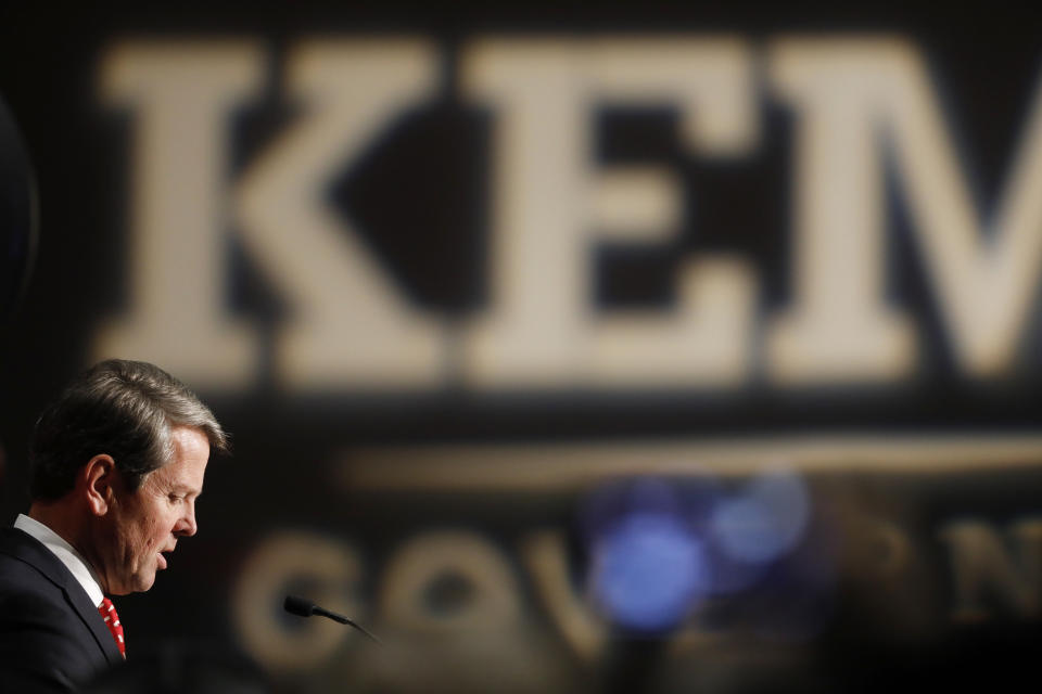 Georgia Republican gubernatorial candidate Brian Kemp speaks with supporters after a long election night in Athens, Ga., Wednesday, Nov. 7, 2018. Georgia's hotly contested and potentially historic governor's race may not be over yet, with Democrat Stacey Abrams and Kemp awaiting the final accounting of absentee and provisional ballots. (Joshua L. Jones/Athens Banner-Herald via AP)