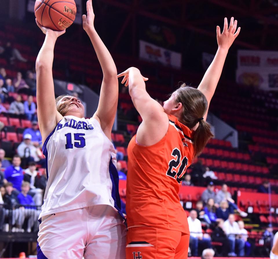 Horseheads' Jordyn Gross goes up for a shot as Union-Endicott's Allison Stank defends during the Blue Raiders' 68-44 win in the Section 4 Class AA girls basketball championship game March 3, 2024 at Visions Veterans Memorial Arena in Binghamton.