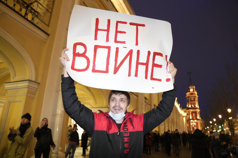 A demonstrator holds a sign reading “No war!” in St. Petersburg, Russia, on Thursday, Feb. 24, 2022. The Kremlin's crackdown against those critical of what it calls a "special military operation" has been ruthless and unparalleled in the history of post-Soviet Russia. Most of those daring to take to the streets are swiftly arrested. (AP Photo, File)