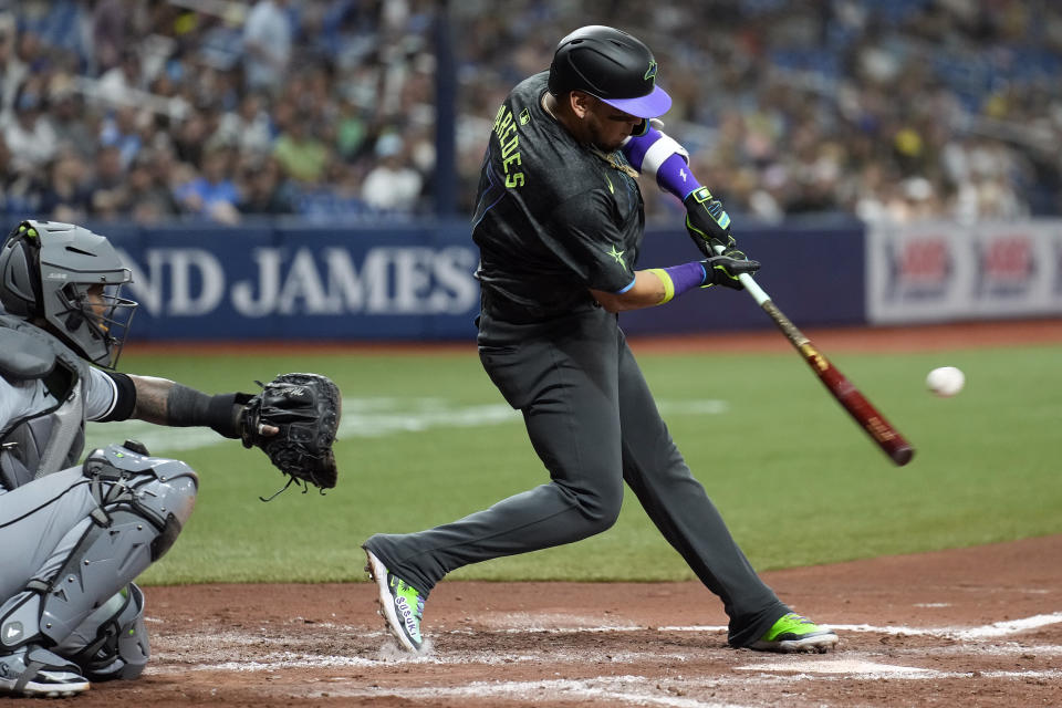 Tampa Bay Rays' Isaac Paredes lines an RBI double off Chicago White Sox starting pitcher Chris Flexen during the fourth inning of a baseball game Wednesday, May 8, 2024, in St. Petersburg, Fla. (AP Photo/Chris O'Meara)