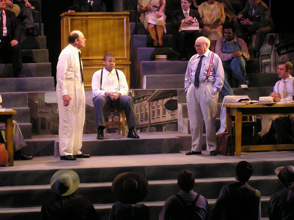 Jim Palmer (as Matthew Harrison Brady), Darius Blakney (as Howard) and Bennett Wood (as Henry Drummond) perform in a scene from the Theatre Memphis production of "Inherit the Wind." Wood, a Memphis stage legend, died Sunday, Sept. 3, 2023, at the age of 91.