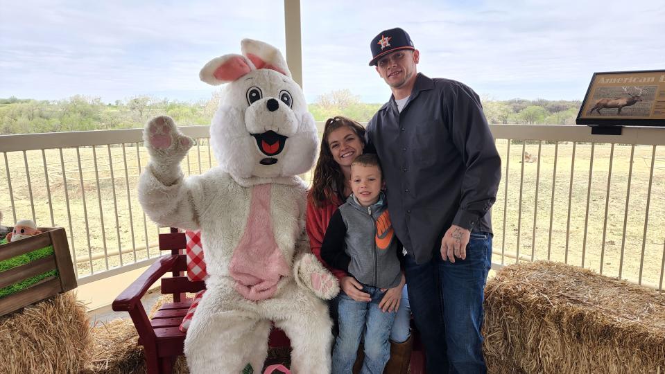 A family catches up with the Easter Bunny during an appearance at last year's "Easter Eggcitement" at the Amarillo Zoo.