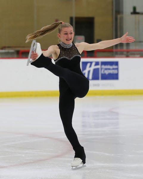 Nicole Czuhajewski, as an Adrian College senior from Kalamazoo, skates in the Collegiate Figure Skating Championships at Adrian College's Arrington Ice Arena.