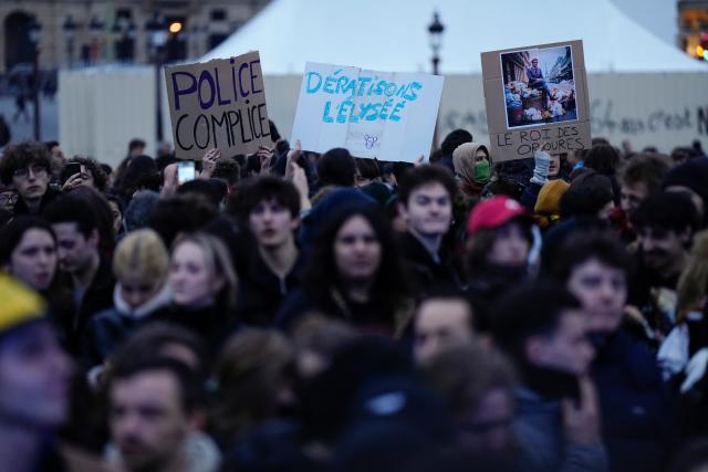Demonstrators stage a protest in Paris, Friday, March 17, 2023.