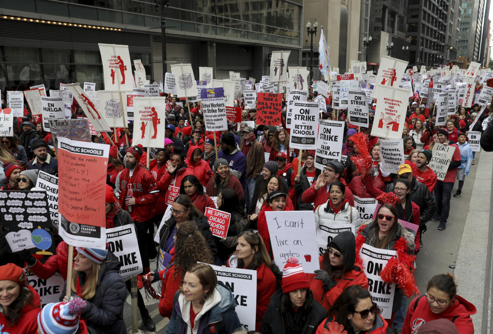 Striking Chicago Public Schools teachers and supporters rally in front of CPS headquarters in downtown Chicago on Thursday, Oct. 17, 2019. (Abel Uribe/Chicago Tribune via AP)