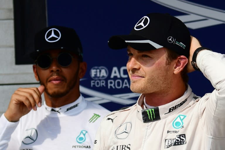 Nico Rosberg (R) leads Lewis Hamilton (L) by one point in the world championships, ahead of the Hungarian Grand Prix on July 24, 2016