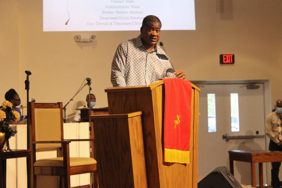 Dr. Tyrone Blue, pastor of First Missionary Baptist Church in SE Gainesville, speaks Sunday at the end of the church's final worship service celebrating his 15th anniversary as pastor of the church.
(Credit: Photo by Voleer Thomas/For The Guardian)