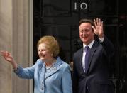 Former British PM Margaret Thatcher and incumbent David Cameron outside 10 Downing Street, London, June 8, 2010. Thatcher, the controversial "Iron Lady" who shaped a generation of British politics and was a pivotal figure in the Cold War, has died following a stroke. She was 87