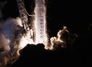 A SpaceX Falcon 9 rocket attached to the cargo-only capsule called Dragon lifts off from the launch pad on October 7, 2012 in Cape Canaveral, Florida. The rocket is bringing cargo to the International Space Station that consists of clothing, equipment and science experiments. (Photo by Joe Raedle/Getty Images)
